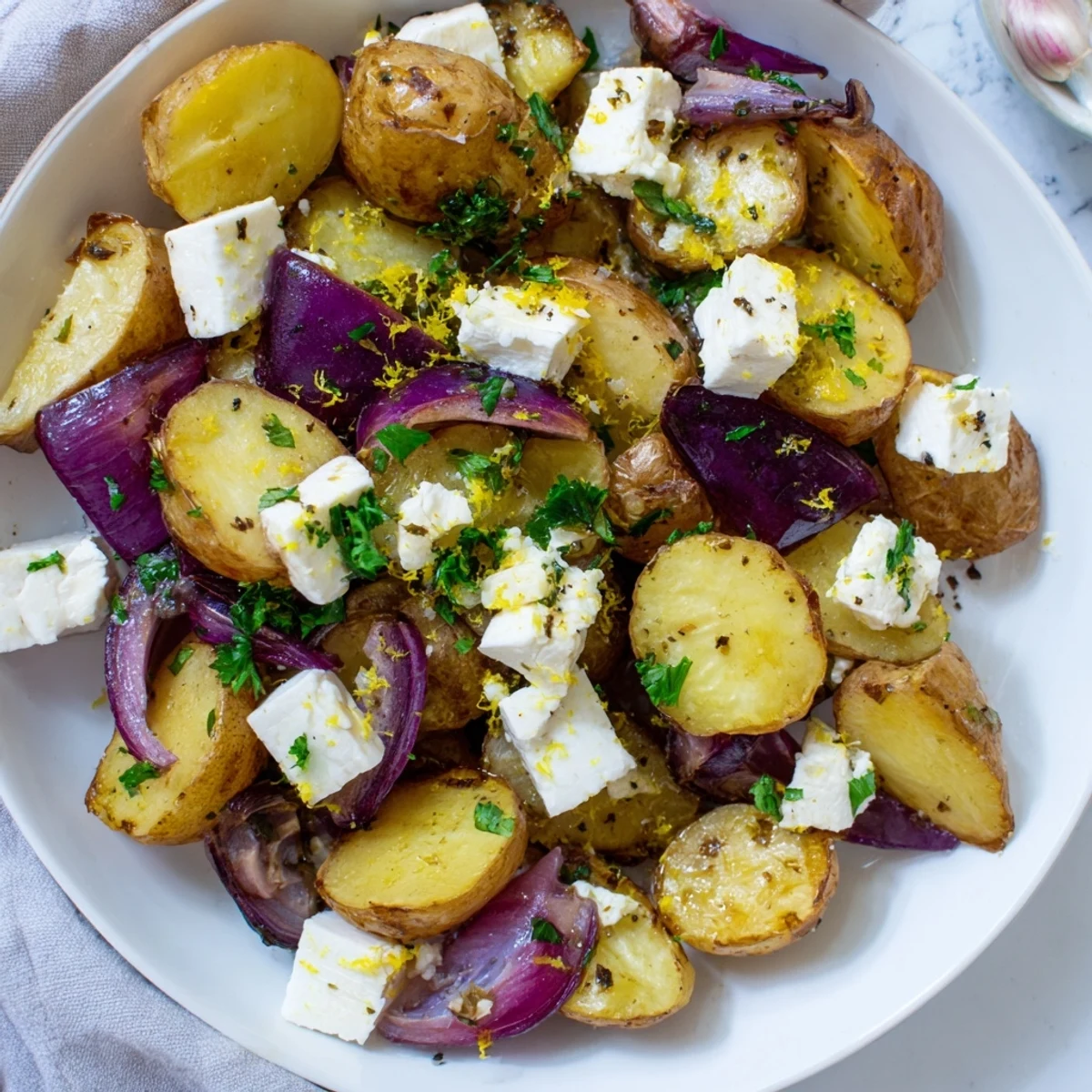 Savory Mediterranean Baked Feta Potatoes with Lemon served warm from the oven as a side dish.  