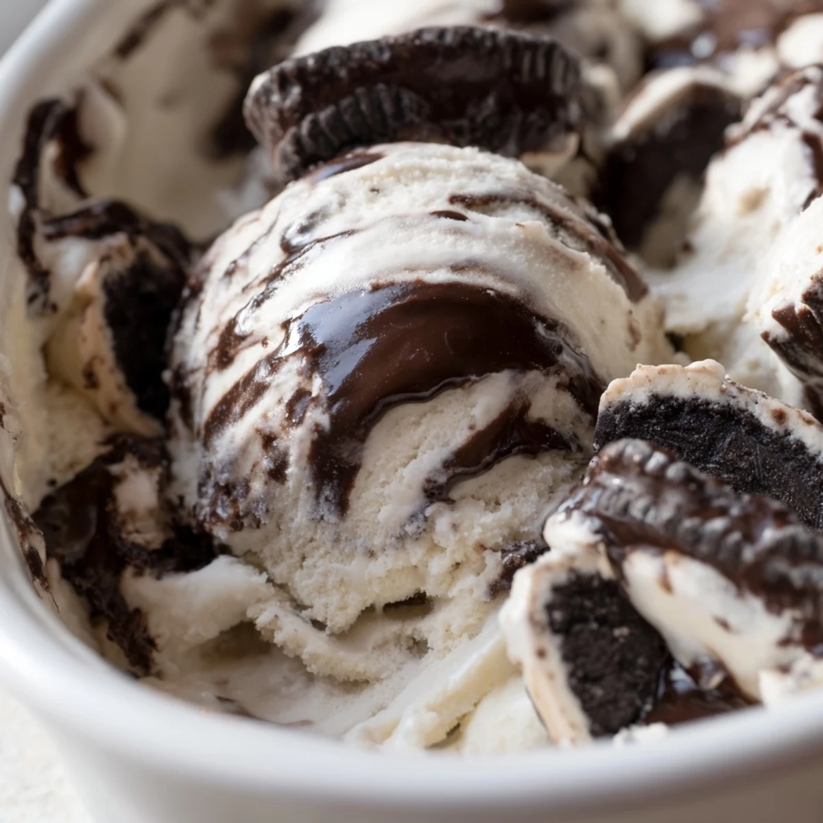 Rich vanilla ice cream layered with chocolate fudge ribbons and chunky peanut butter cups